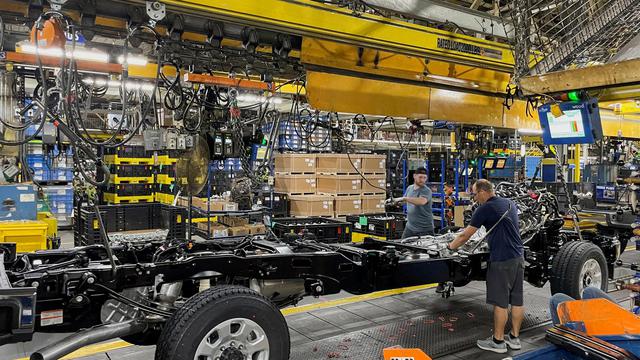 FILE PHOTO: Workers complete a frame for a Ford Super Duty truck at the Kentucky Truck assembly plant in Louisville
