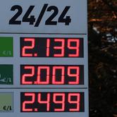 Price board at fuel station in Donges
