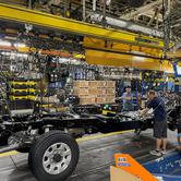 FILE PHOTO: Workers complete a frame for a Ford Super Duty truck at the Kentucky Truck assembly plant in Louisville